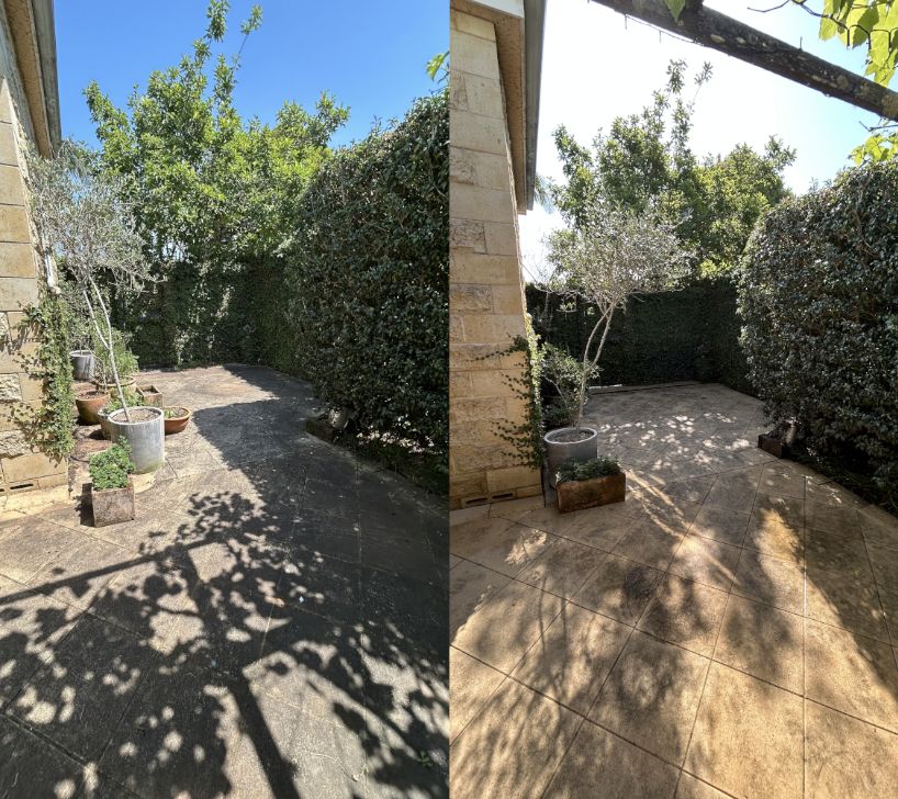 Before and after pressure cleaning a tiled courtyard and pool surround