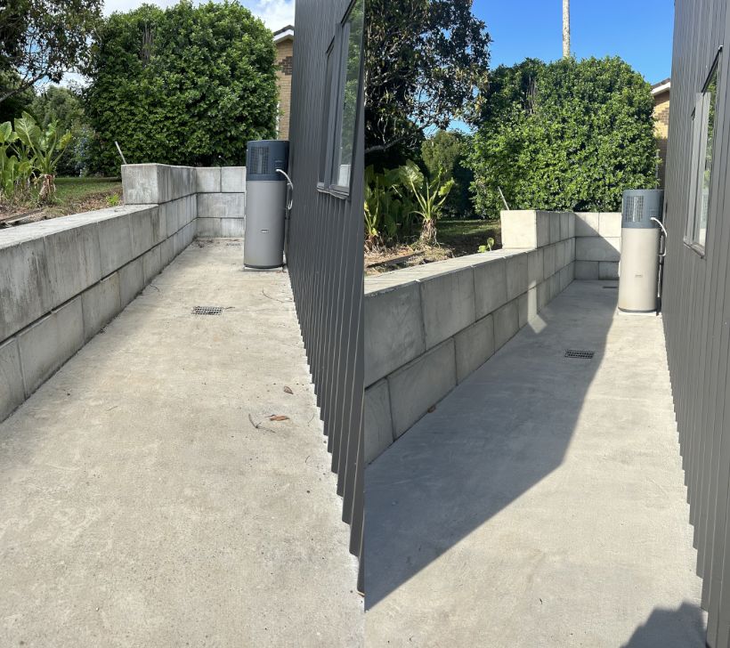 Before and after pressure cleaning a concrete side path